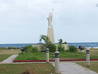 ���R�̏��_