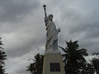 ���R�̏��_