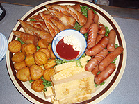 �����i�܂݁j